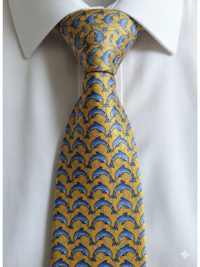 Brooks Brothers yellow silk tie with blue dolphins jumping through hoops - 57"